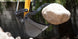 LiuGong 9027F ZTS hydraulic thumb holding a rock